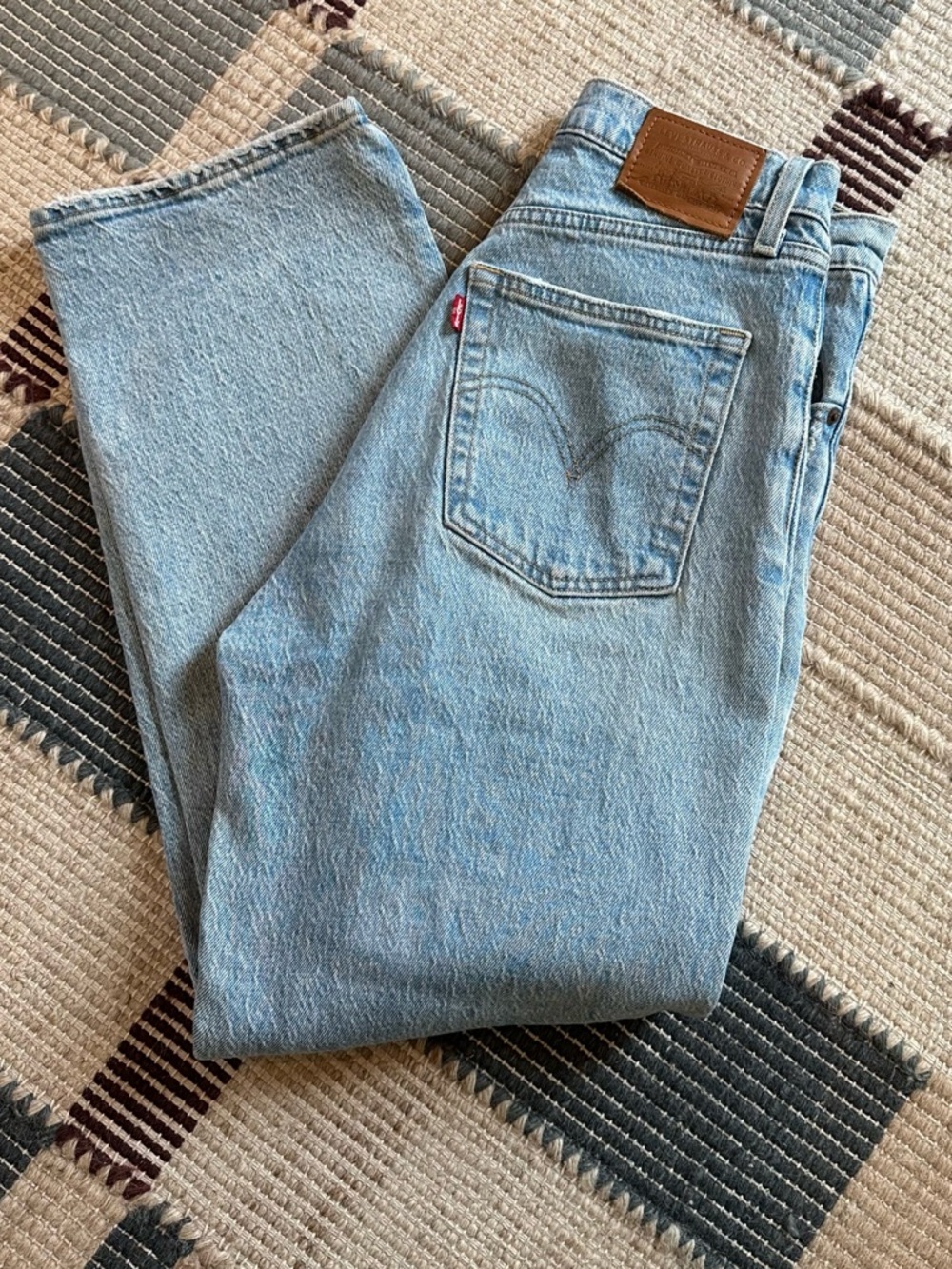 Levi's Ribcage Ankle Light Wash Distressed Jeans